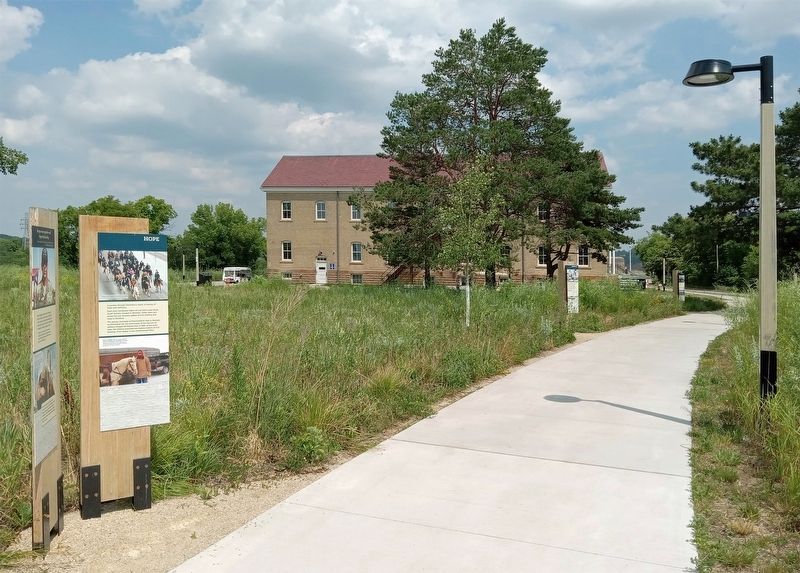 Hope Marker (left) on a path west of the Historic Fort Snelling visitor center image. Click for full size.