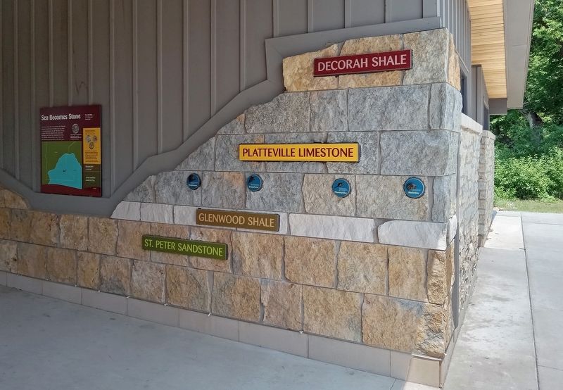 Sea Becomes Stone Marker at the corner of the picnic shelter. Click for full size. Sea Becomes Stone Marker at the corner of the picnic shelter image. Click for full size.