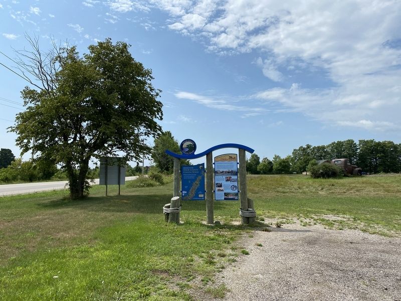 Town of Liberty Grove Marker (right), from the north. Click for full size. Town of Liberty Grove Marker (right), from the north image. Click for full size.
