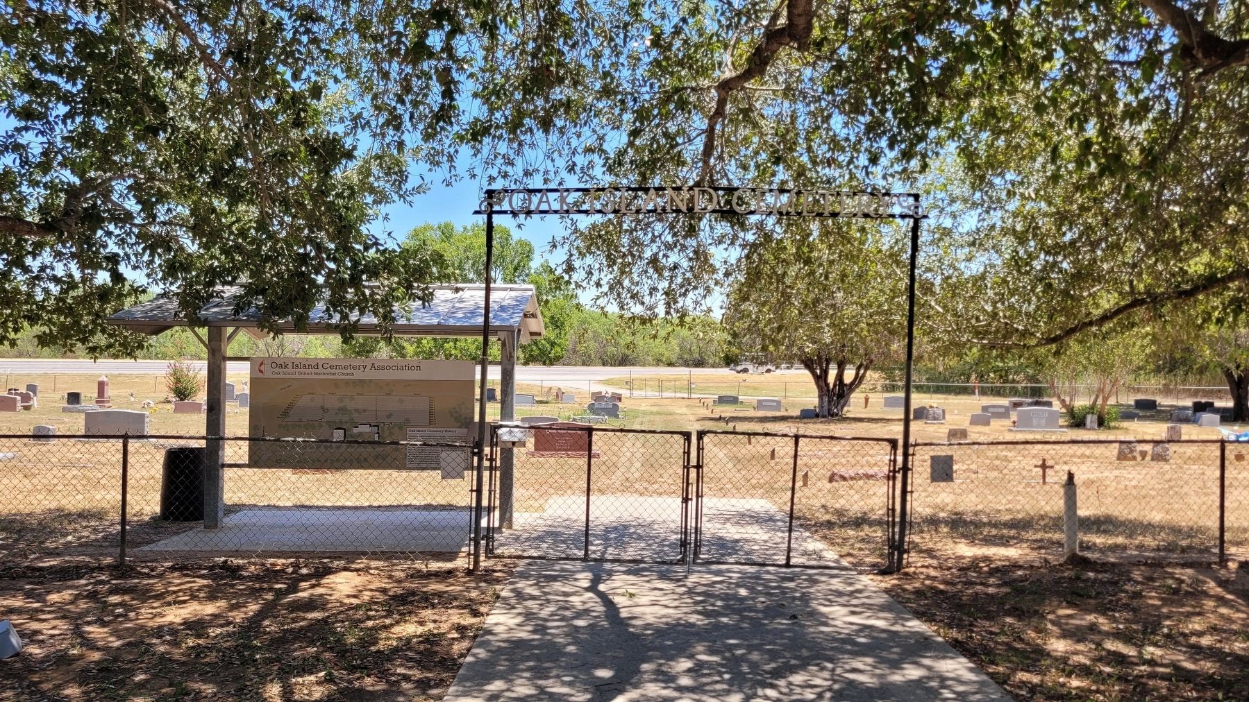 The north entrance to the Oak Island Cemetery and marker image. Click for full size.