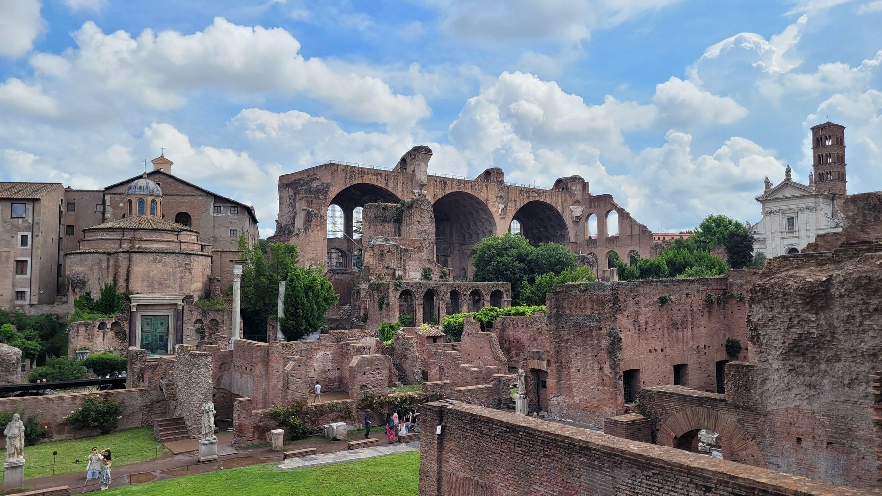 The view of the Roman Forum where the road goes through it. Click for full size. The view of the Roman Forum where the road goes through it image. Click for full size.