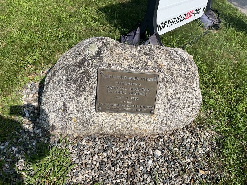 An additional National Register plaque has been affixed to a rock in front of the Town Hall image. Click for full size.