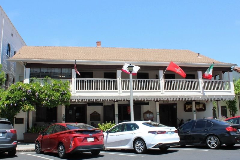 Swiss Hotel and Hap's Hat Hangs Here Marker image. Click for full size.