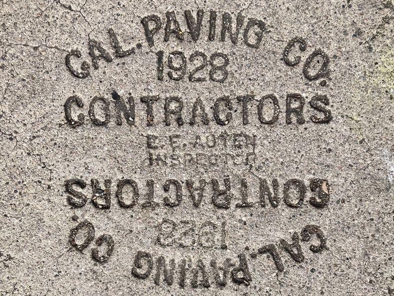 Sidewalk Contractor Stamp - 1928 image. Click for full size.