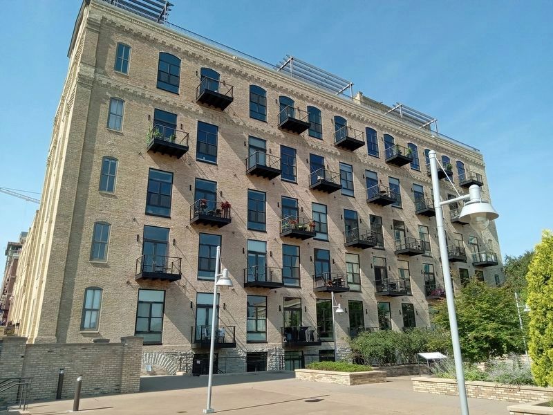 Bricks and Mortar Marker (right) in the plaza north of the Whitney Lofts image. Click for full size.