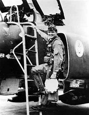 First Lieutenant Lance P. Sijan in front of a F-4 Phantom II aircraft. image. Click for full size.