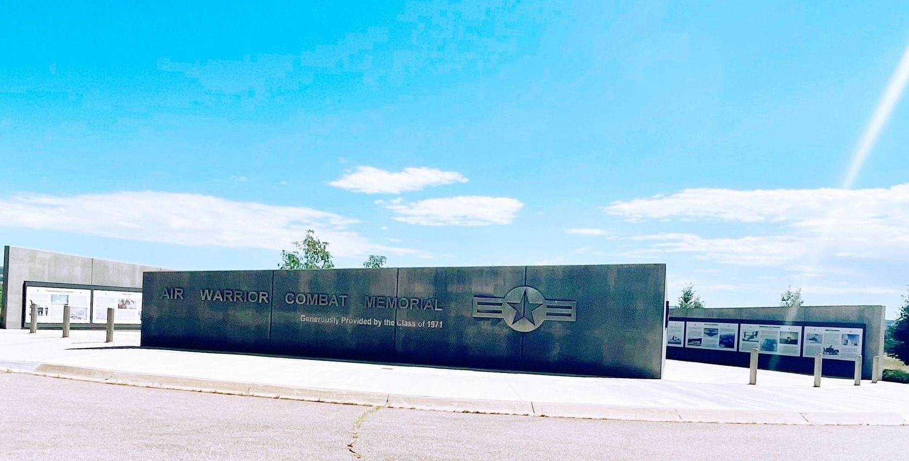 Air Warrior Combat Memorial sign with marker on far right. image. Click for full size.