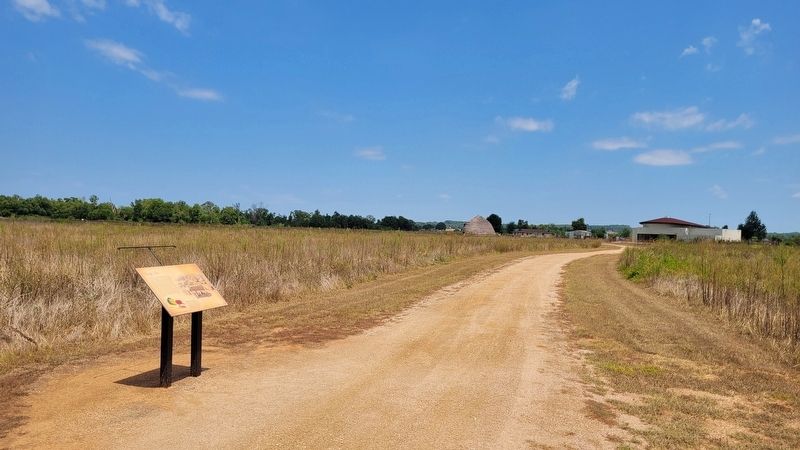 The Village Life Marker looking toward the Visitor�s Center and the Caddo House image. Click for full size.