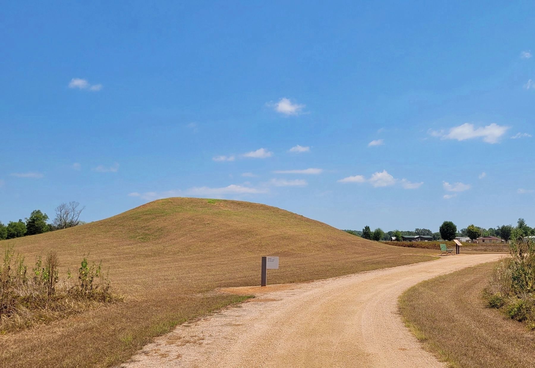 The view of the Burial Mound and Marker from the hiking trail loop image. Click for full size.