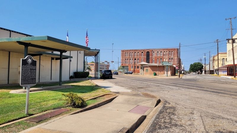 The view of the Site of McKnight Plaza Marker along the street image. Click for full size.