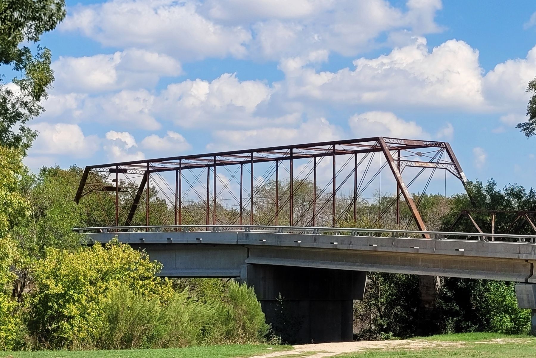 The view of the new bridge and the Clifton Whipple Truss Bridge image. Click for full size.