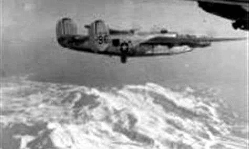B-24J of 404th Bomb Squadron, 11th Air Force image. Click for full size.