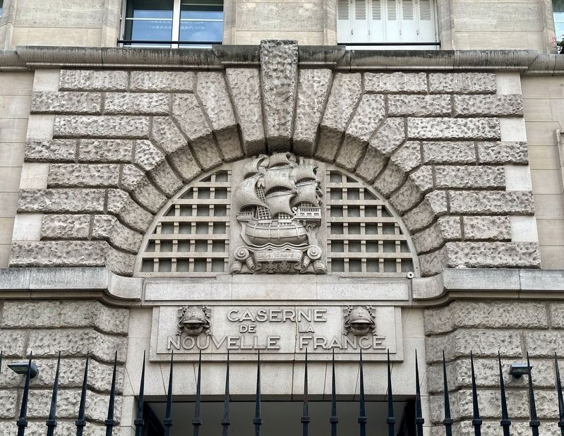 Nouvelle France Barracks - decorative detail above the front entrance. Click for full size. Nouvelle France Barracks - decorative detail above the front entrance image. Click for full size.
