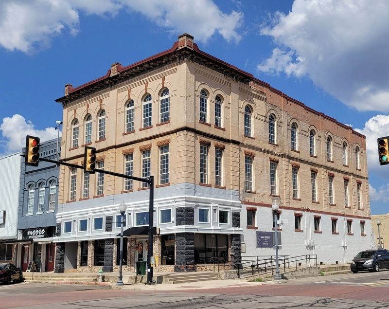 The view of the Russell's Opera House Marker and building from across the street image. Click for full size.