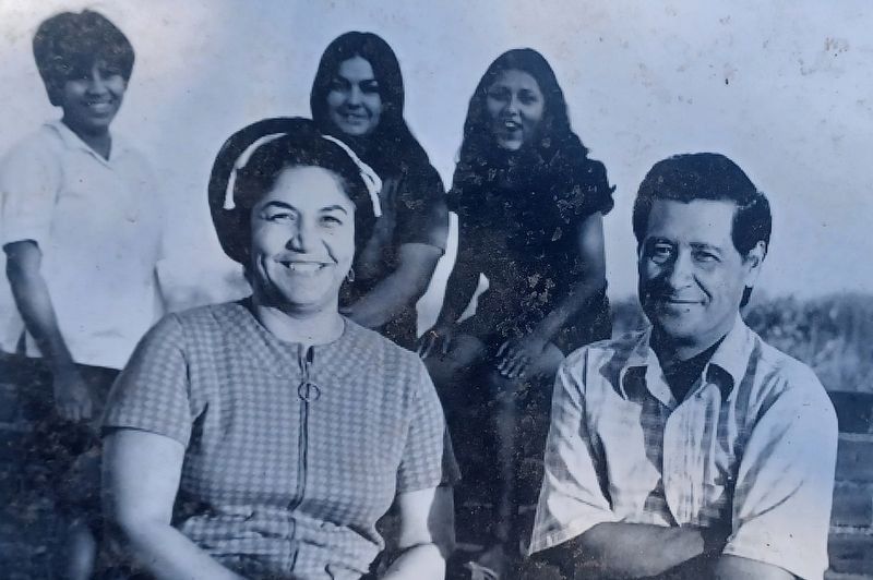 Cesar and Helen with three of their children image. Click for full size.