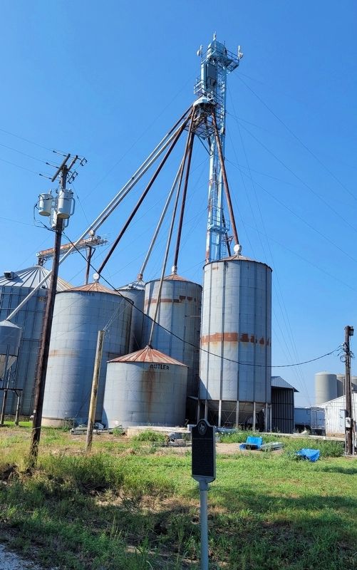 The view of the Site of Bralley-Pendleton School Marker next to the grain silos. Click for full size. The view of the Site of Bralley-Pendleton School Marker next to the grain silos image. Click for full size.