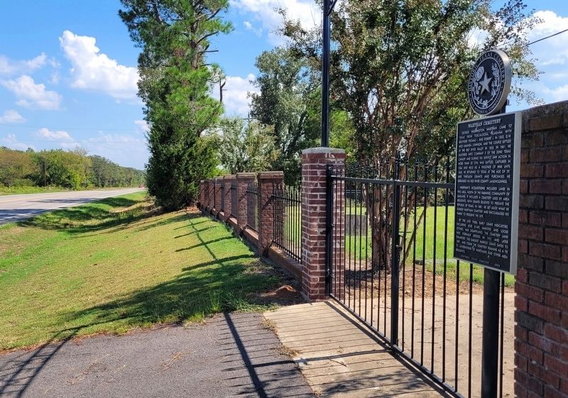 The view of the Warthan Cemetery and Marker by the highway. Click for full size. The view of the Warthan Cemetery and Marker by the highway image. Click for full size.