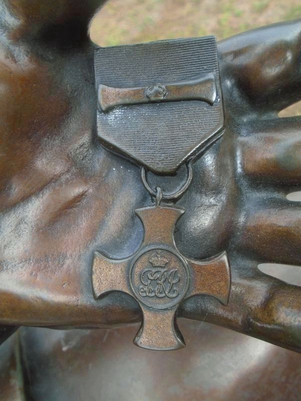 Distinguished Service Cross and Bar in<br>A. Roy Brown's Hand image. Click for full size.