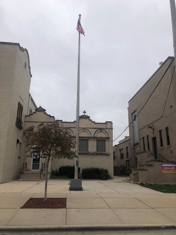 St. Mary of Celle Parish War Memorial and flagpole image. Click for full size.