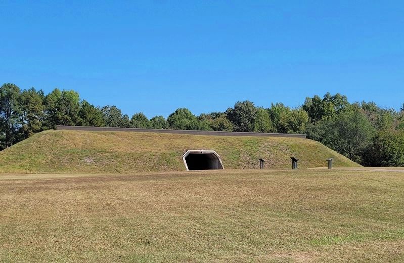 The view of the four markers with the museum and visitors center in the background. Click for full size. The view of the four markers with the museum and visitors center in the background image. Click for full size.