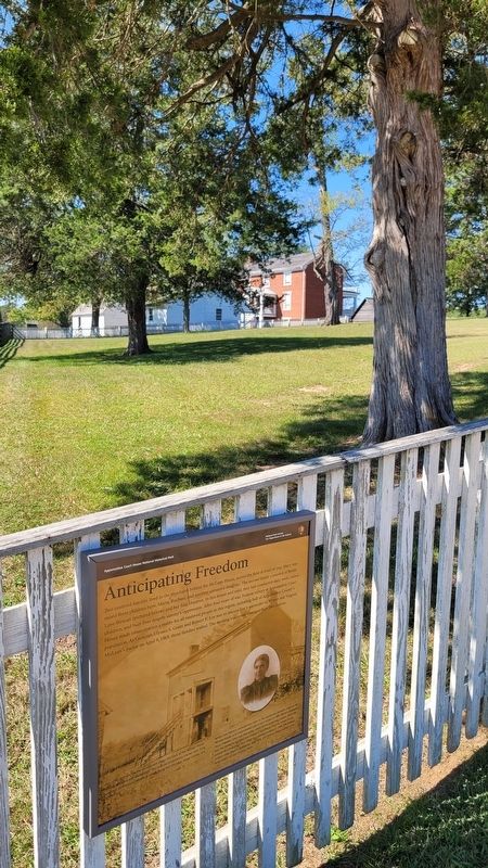 The marker with the slaves quarters in the distance image. Click for full size.
