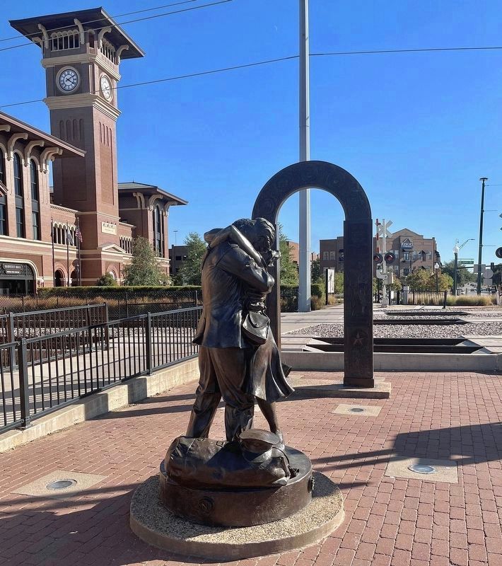 "Coming Home" Statue and Arch. Click for full size. "Coming Home" Statue and Arch image. Click for full size.