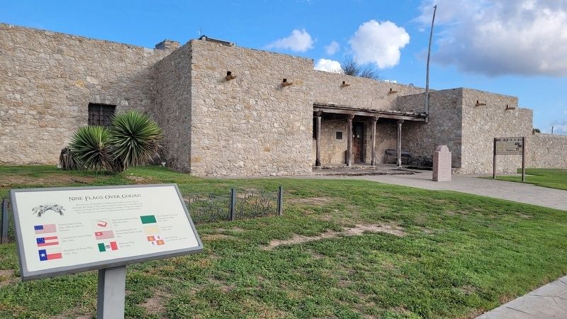 The Nine Flags Over Goliad Marker in front of the Presidio La Bah�a image. Click for full size.