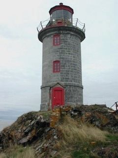 Pilier de Pierre Heritage Lighthouse image. Click for more information.
