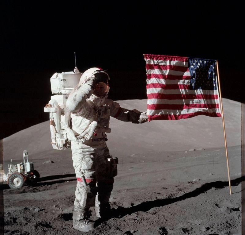 Cernan salutes the flag on the moon. Click for full size. Cernan salutes the flag on the moon image. Click for full size.