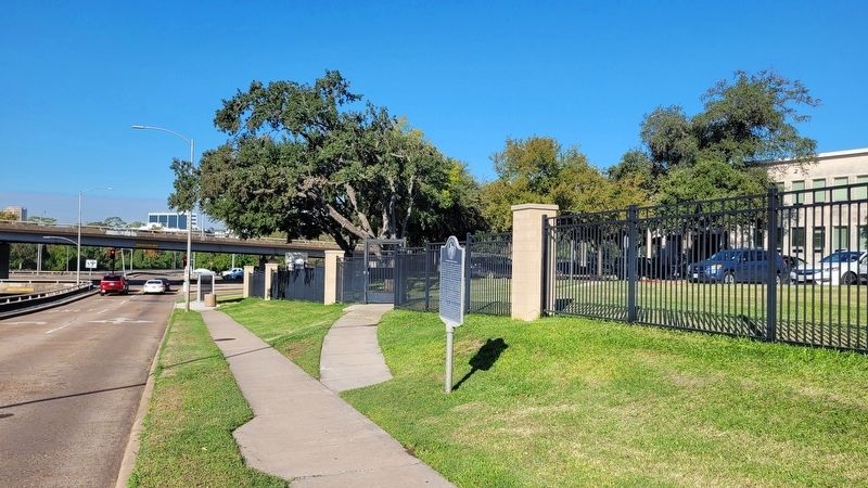 The view of the St. Thomas High School Marker along the highway image. Click for full size.