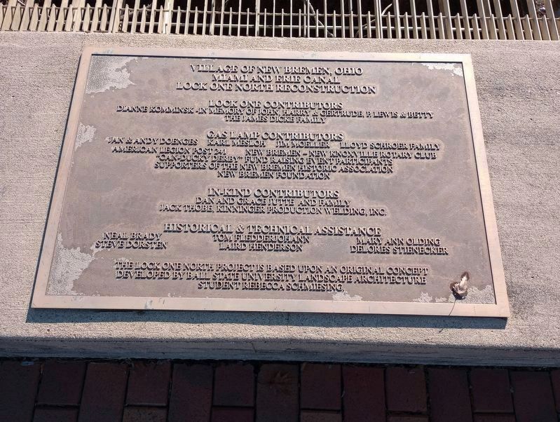 Nearby dedication plaque image. Click for full size.