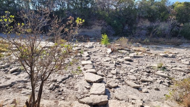 The trail of stones across the dry Paluxy River to the dinosaur tracks image. Click for full size.