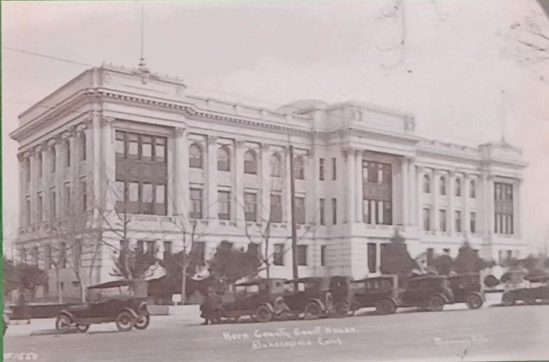 Marker detail: New Courthouse built in 1912 across the street from the original courthouse. image. Click for full size.
