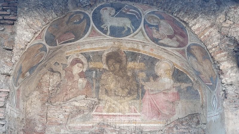 A fresco-depicting Christ descended from the cross between the Virgin Mary and St. John the Apostle image. Click for full size.