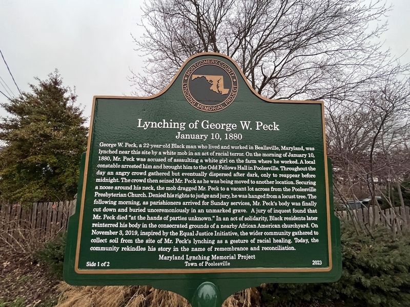 Lynching of George W. Peck side of the marker image. Click for full size.