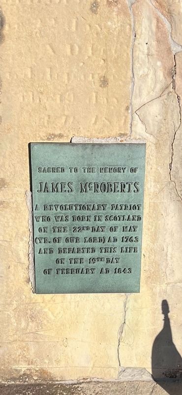 A close up of the nearby James Roberts dedication plaque image. Click for full size.
