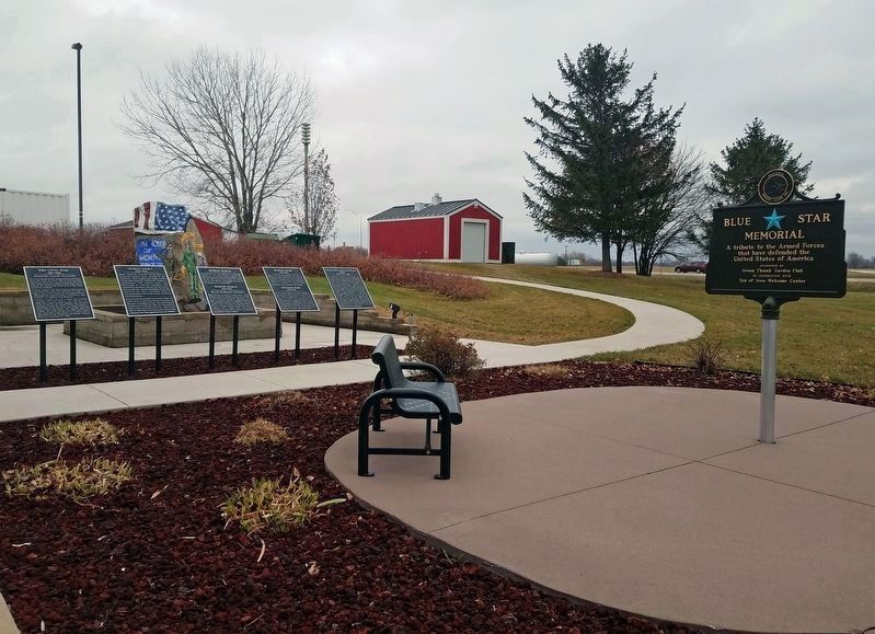 The Marker (rightmost in background) at the Hartland Rest Area and Iowa Welcome Center image. Click for full size.