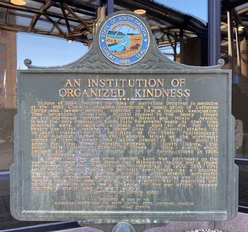 An Institution of Organized Kindness Marker, Side One image. Click for full size.