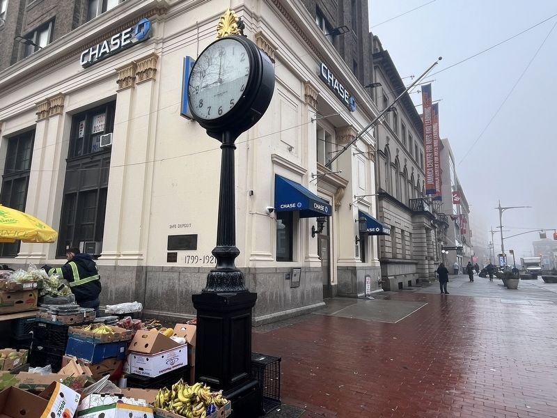 The Jamaica Center Sidewalk Clock with its interpretive marker on the building in the background. Click for full size. The Jamaica Center Sidewalk Clock with its interpretive marker on the building in the background image. Click for full size.