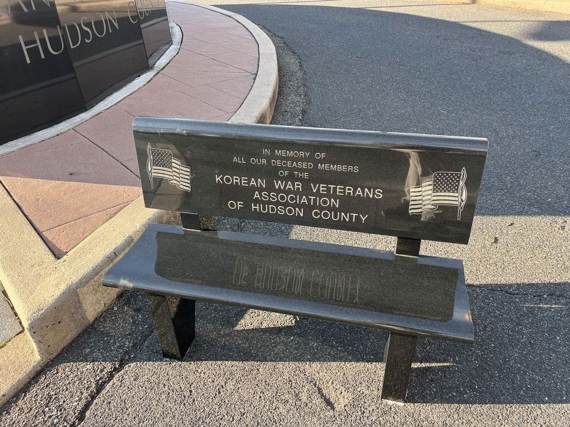 Dedication bench at the memorial image. Click for full size.