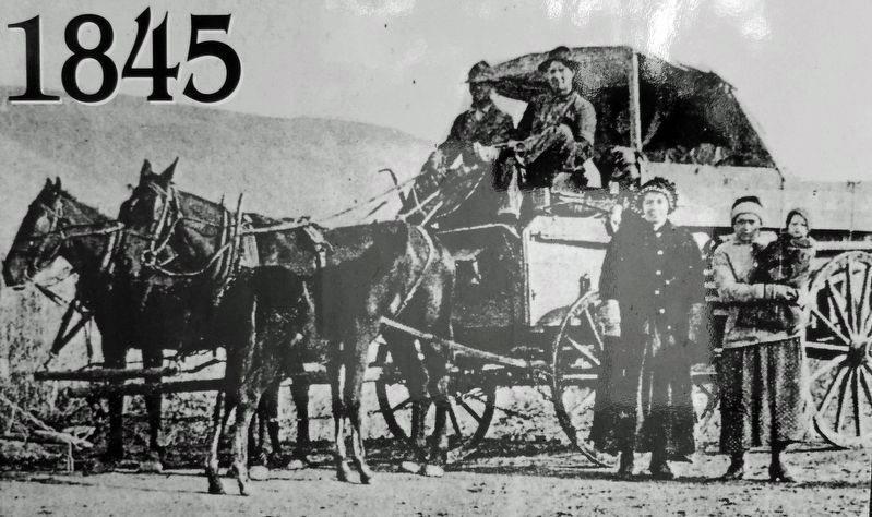 Marker detail: Early settlers in a Prairie Schooner. Click for full size. Marker detail: Early settlers in a Prairie Schooner image. Click for full size.