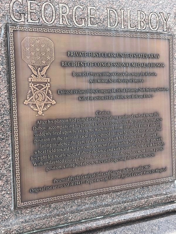 Plaque on north-facing side of statue image. Click for full size.