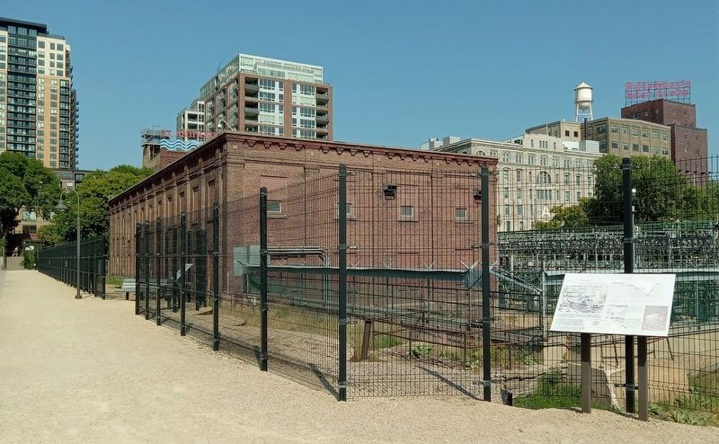 Hydroelectricity Comes of Age Marker and the Hennepin Island Hydroelectric Plant. Click for full size. Hydroelectricity Comes of Age Marker and the Hennepin Island Hydroelectric Plant image. Click for full size.