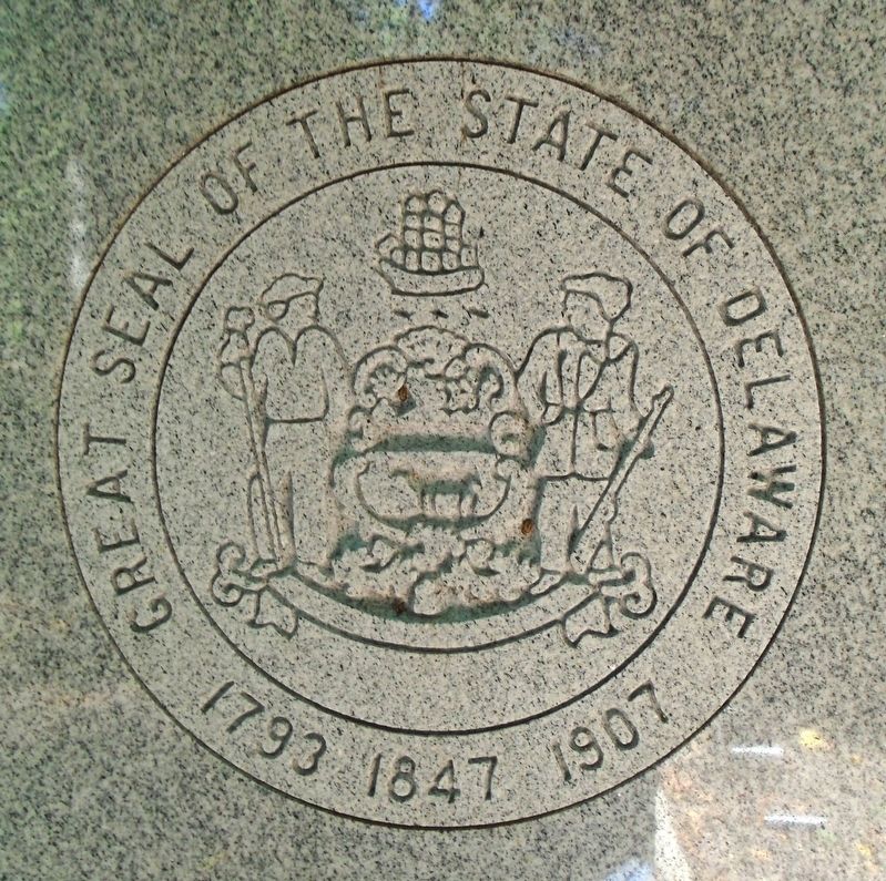 Delaware State Seal on Memorial Obelisk image. Click for full size.