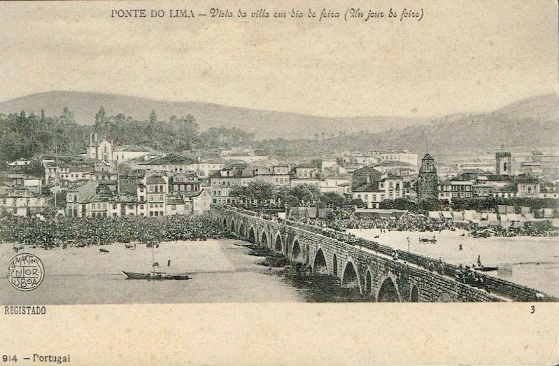 View of the town on the day of a fair, looking across the river to the marker site image. Click for full size.