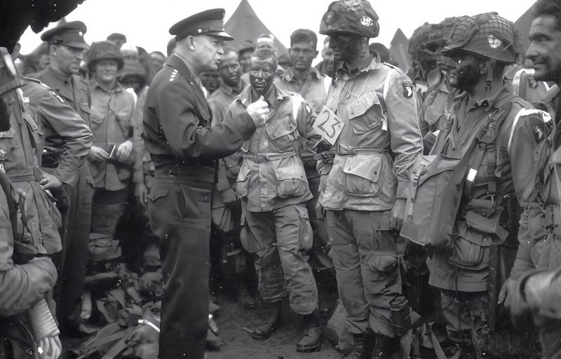 General Eisenhower talking with members of the 101st Airborne Division image. Click for full size.
