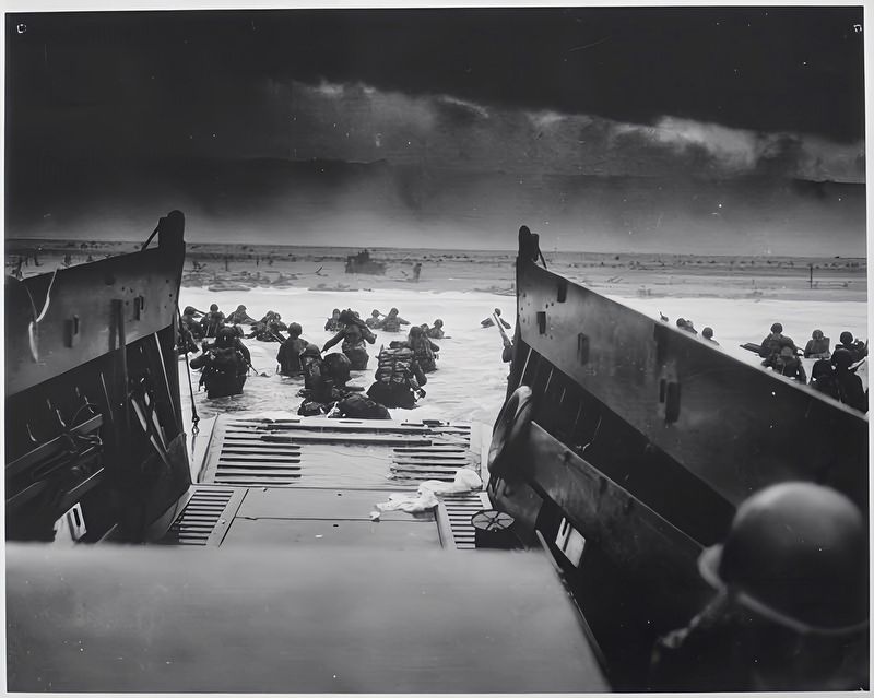 U.S. Troops exiting Assault Landing Craft Omaha Beach image. Click for full size.
