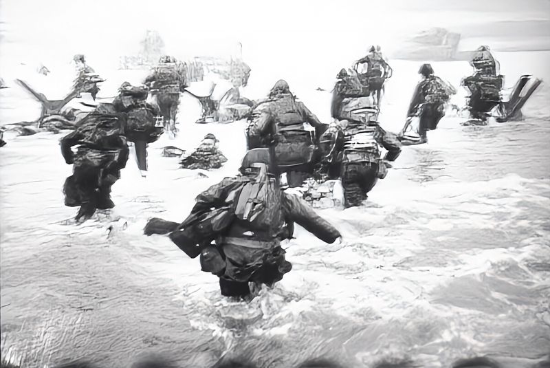 Troops landing on Omaha Beach 6 June 1944 image. Click for full size.