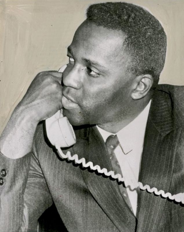 Mayor Richard G. Hatcher talks on the phone, Gary, Indiana, 1968 image. Click for full size.