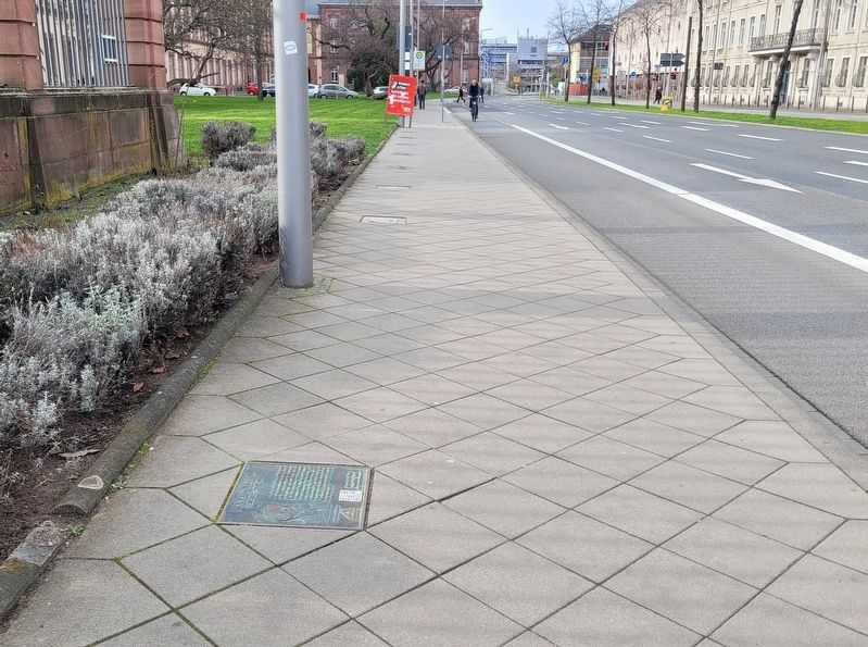 The view of the Adolf Kumaul Marker along the sidewalk image. Click for full size.